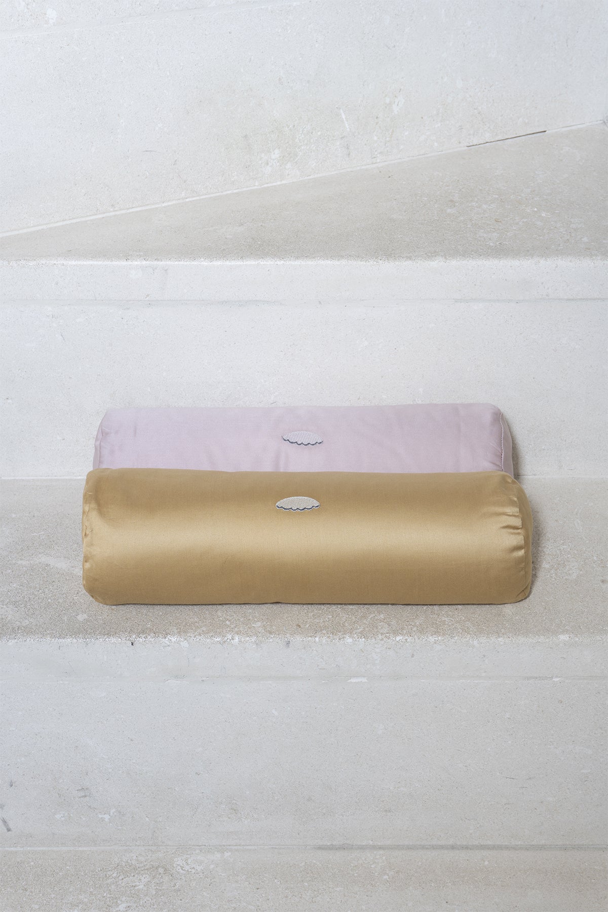 "Hilde" roll-neck pillow in Margot Pink
