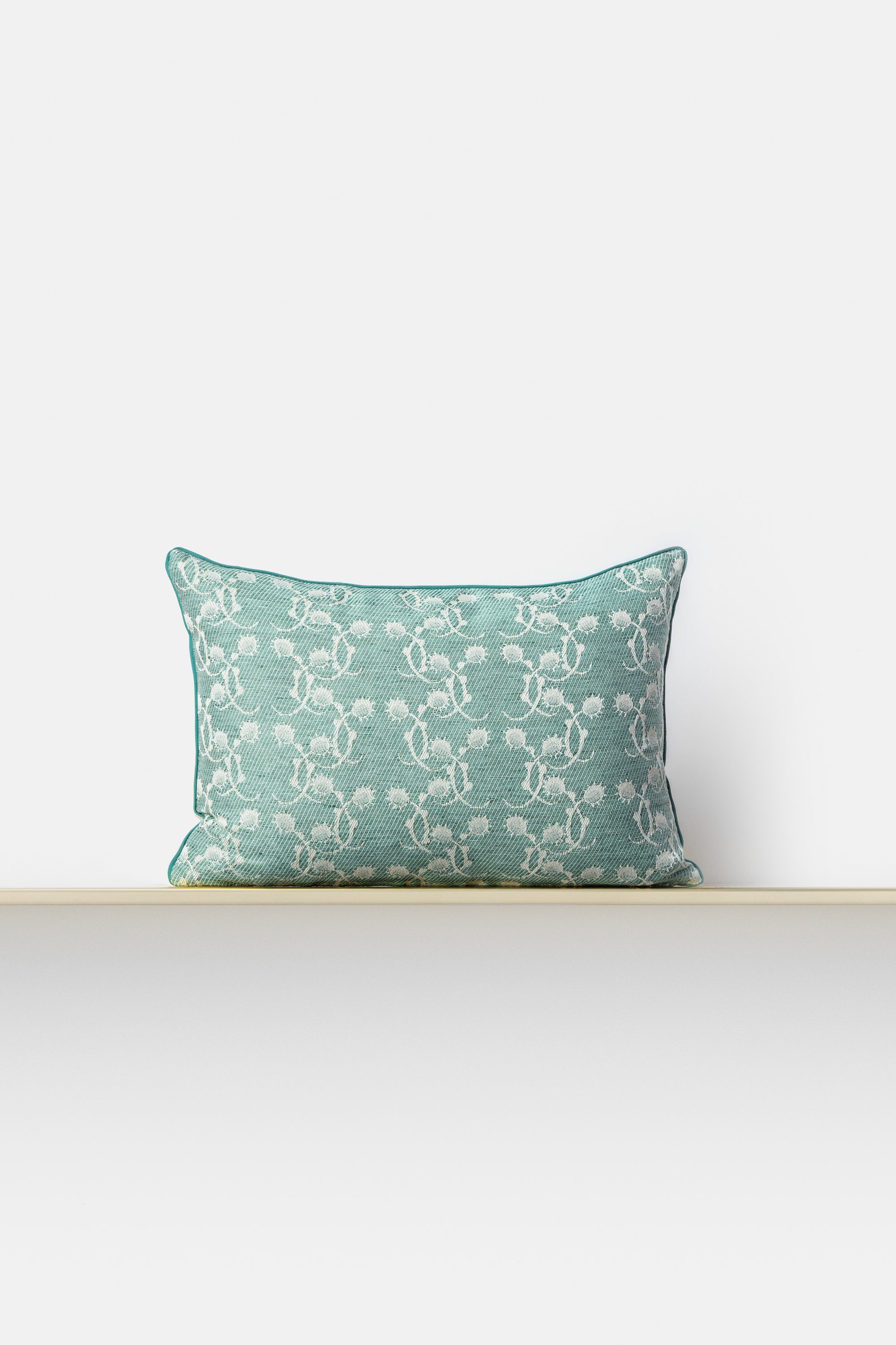 "F71 Cardo" rectangular cushion cover in Giada Green