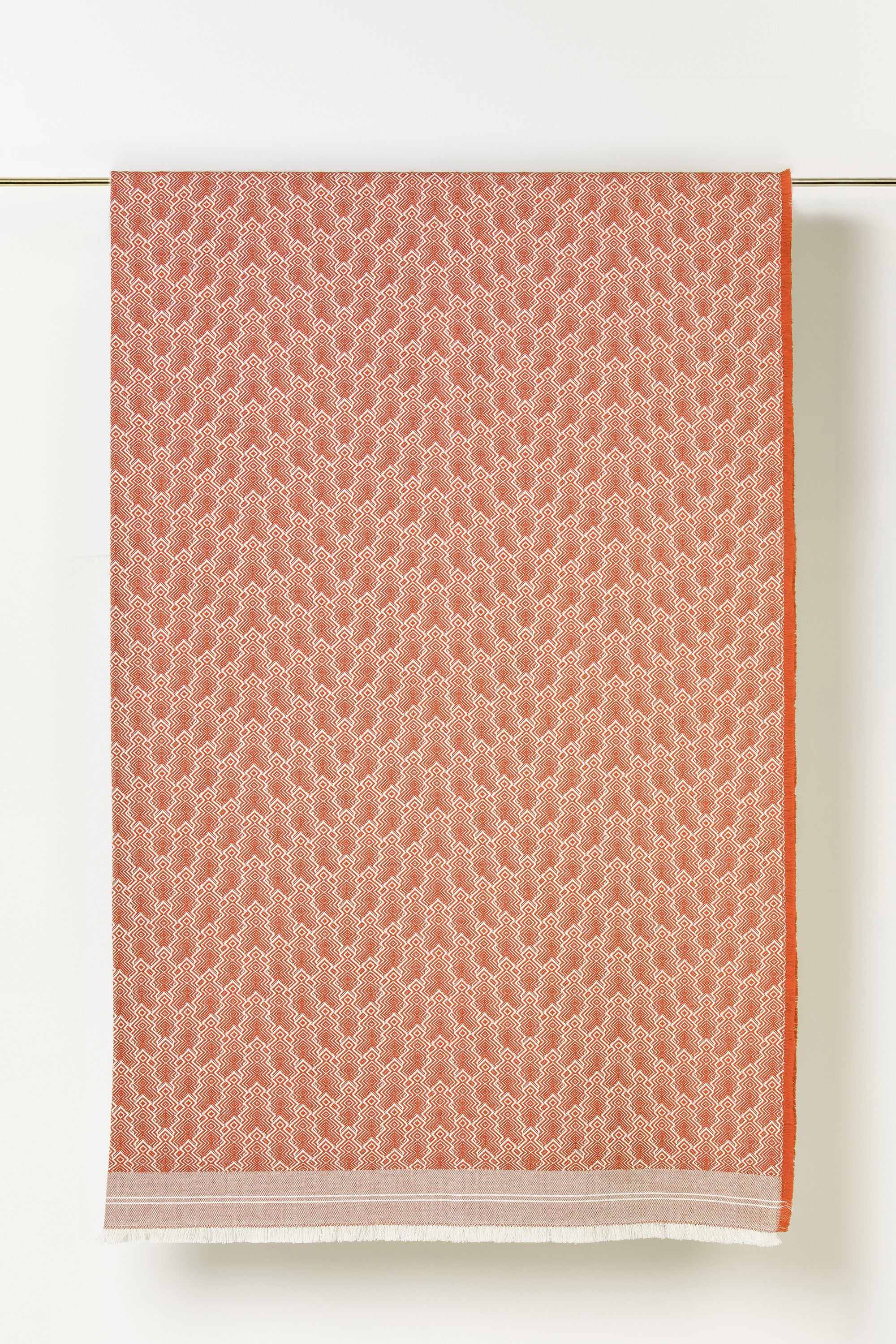 "F28" wool throw in Tangerine