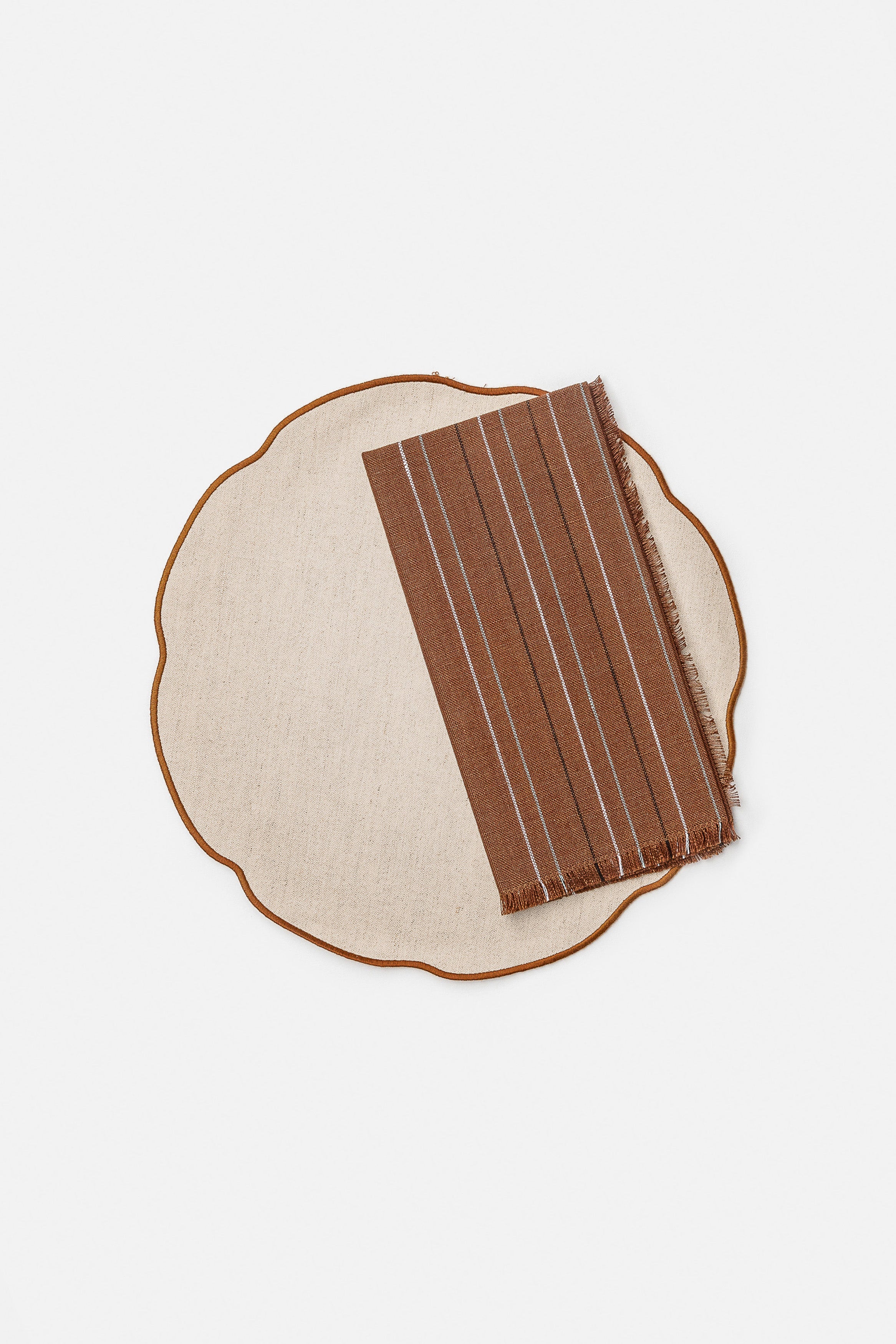 "Nura" placemat in Salt Pepper / Pain Brûlé