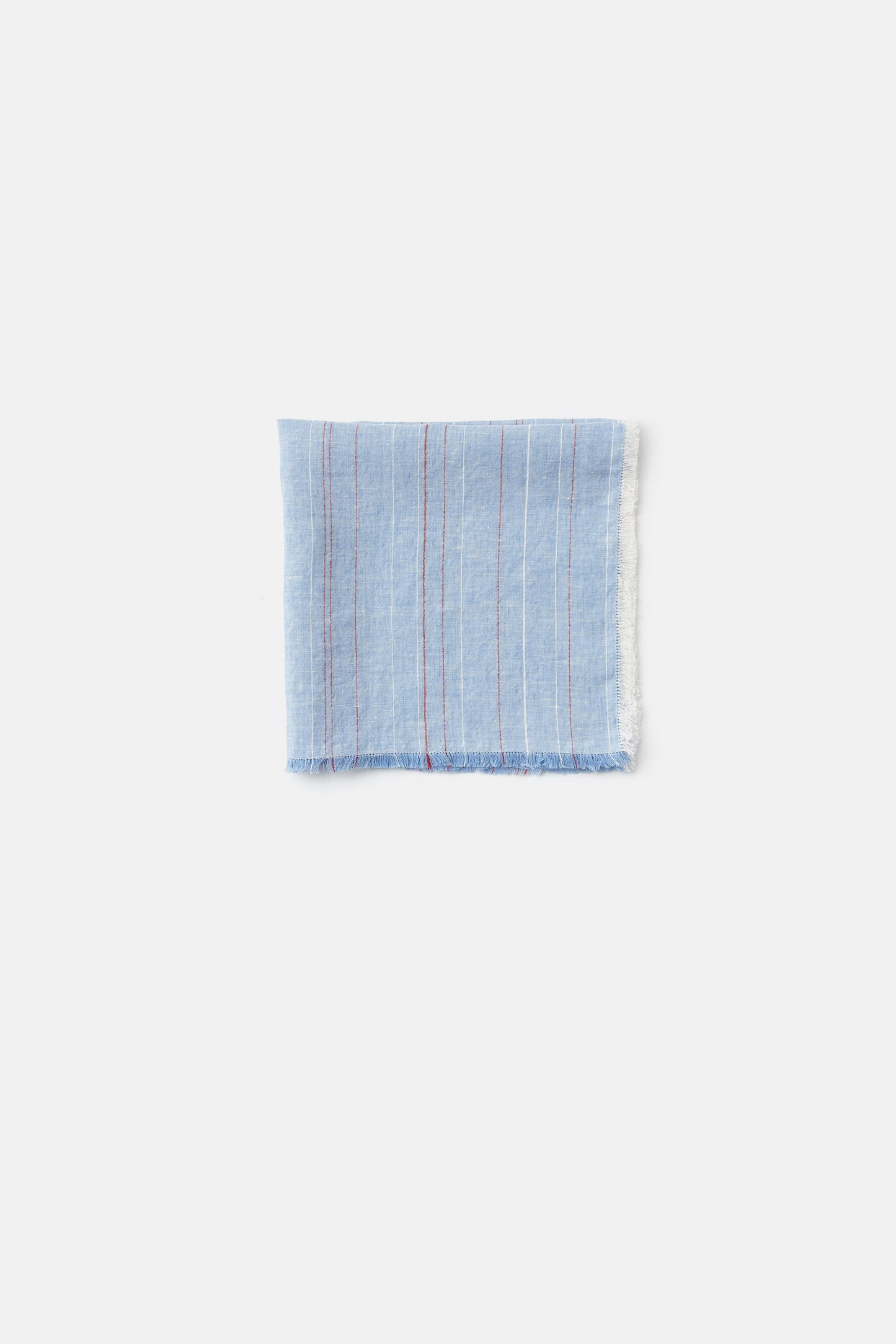 "Greta" napkin in Garda Blue / Red