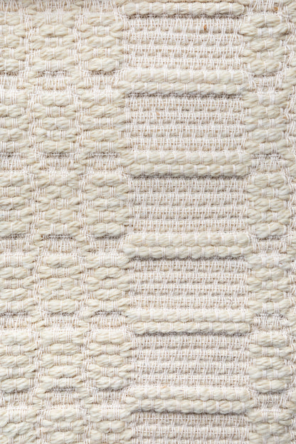 "Pinto Chiocciolina" rug in Natural White